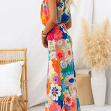 Estate | Robe maxi sans manches avec nœud à la taille et imprimé floral