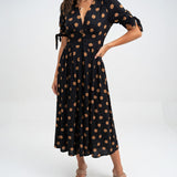 Clarisse™ — Robe midi à pois élégance naturelle