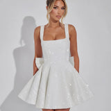 Robe Mini à Nœud en Sequins Éblouissants Victoria