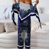 Helen | Ensemble élégant de deux pièces avec top à lacets et pantalon prêt pour les vacances